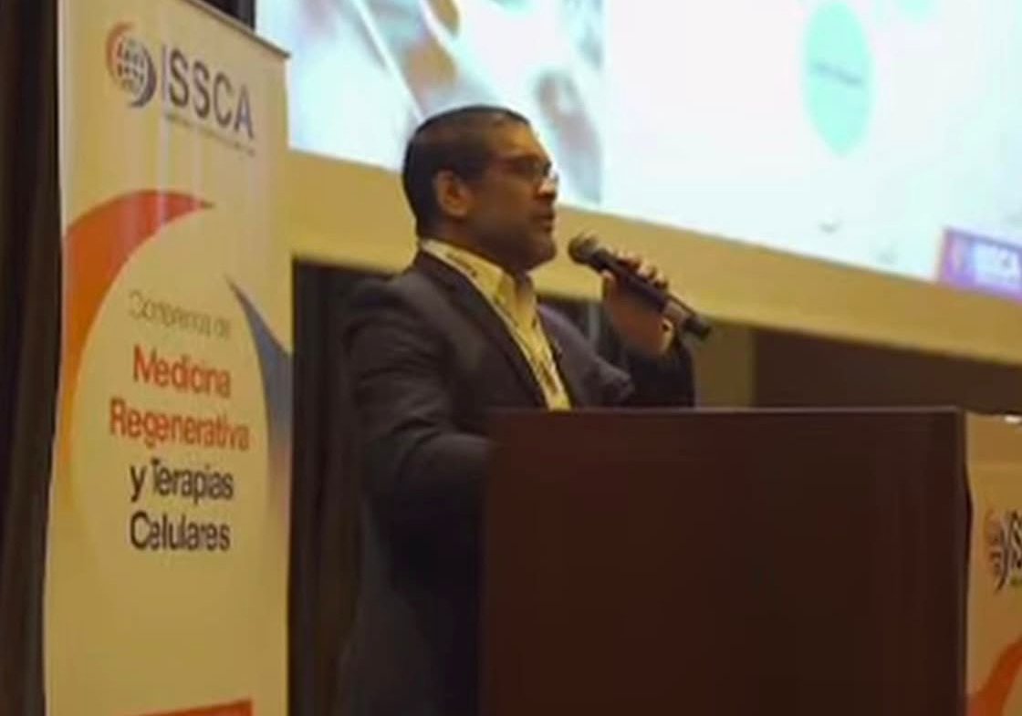 Dr. Christopher Walker teaching regenerative medicine at an international physician training event