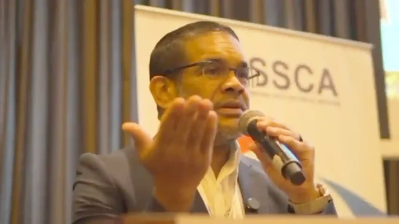 Dr Christopher Walker speaking at an ISSCA regenerative medicine conference
