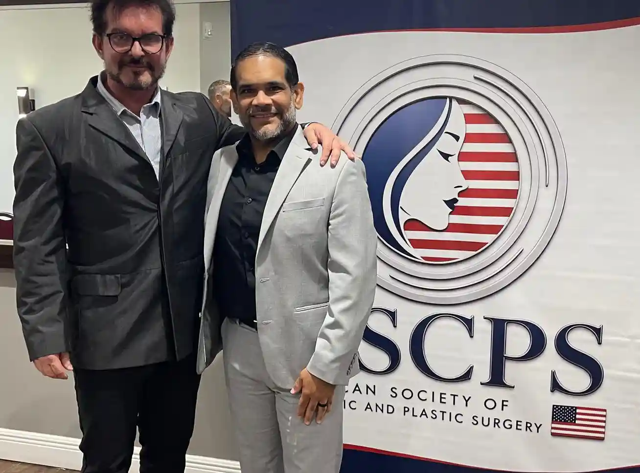 Dr. Christopher Walker with Dr. Roberto Bijos, one of Brazil’s leading surgeons, during an international physician education and medical leadership event