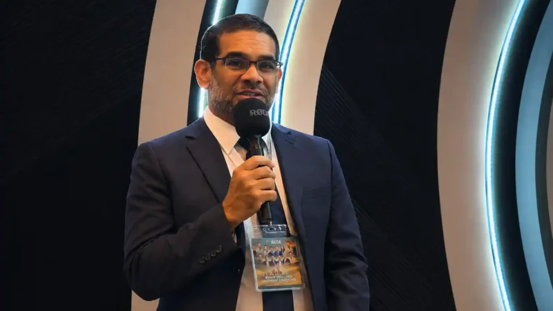 Dr. Christopher Walker delivering a presentation on peptide medicine and physician education at an international medical conference