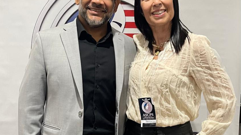 Dr. Christopher Walker with a patient from Brazil who achieved significant weight loss through a personalized wellness and treatment program without surgery