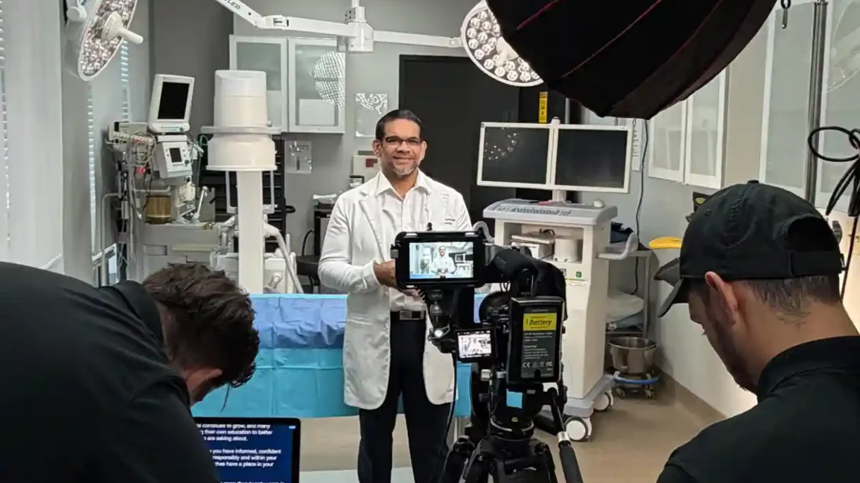 Dr. Christopher Walker recording physician education on regenerative medicine and peptide protocols in a medical training facility