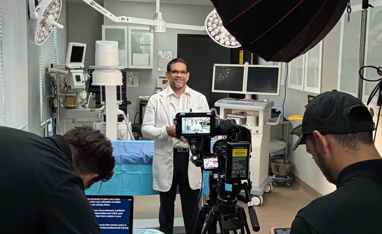 Dr. Christopher Walker recording physician education on regenerative medicine and peptide protocols in a medical training facility