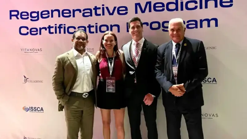 Dr. Christopher Walker with international faculty and physicians at a Regenerative Medicine Certification Program, supporting global physician education and clinical collaboration