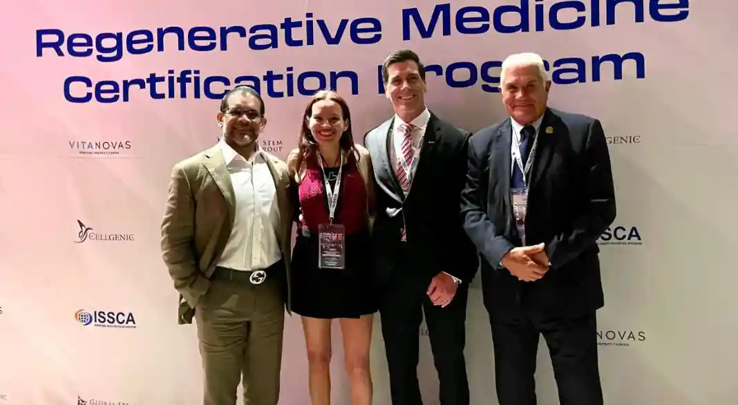 Dr. Christopher Walker with international faculty and physicians at a Regenerative Medicine Certification Program, supporting global physician education and clinical collaboration